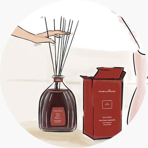 Insert the reeds into the glass bottle Gently insert the reeds into the glass bottle and open them like a fan